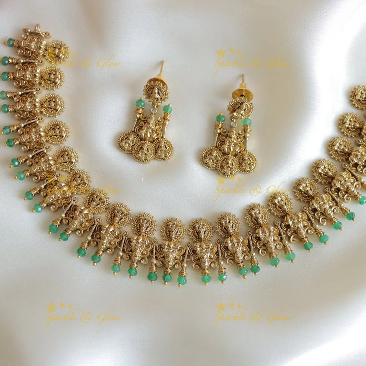 Intricately carved Idol Lakshmi coin design short necklace - Sparkle and Glow
