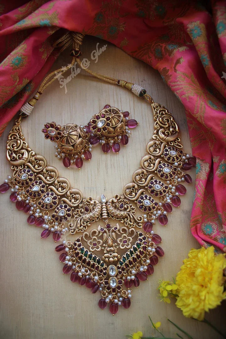 Gold alike polished peacock style grand nagas necklace with pink beads and gutta pusalu - Sparkle and Glow