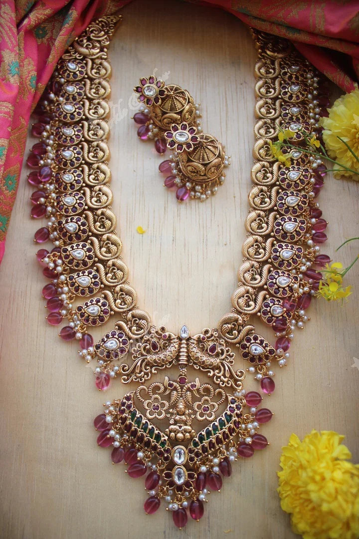 Gold alike polished peacock style grand nagas haram with green and gutta pusalu - Sparkle and Glow