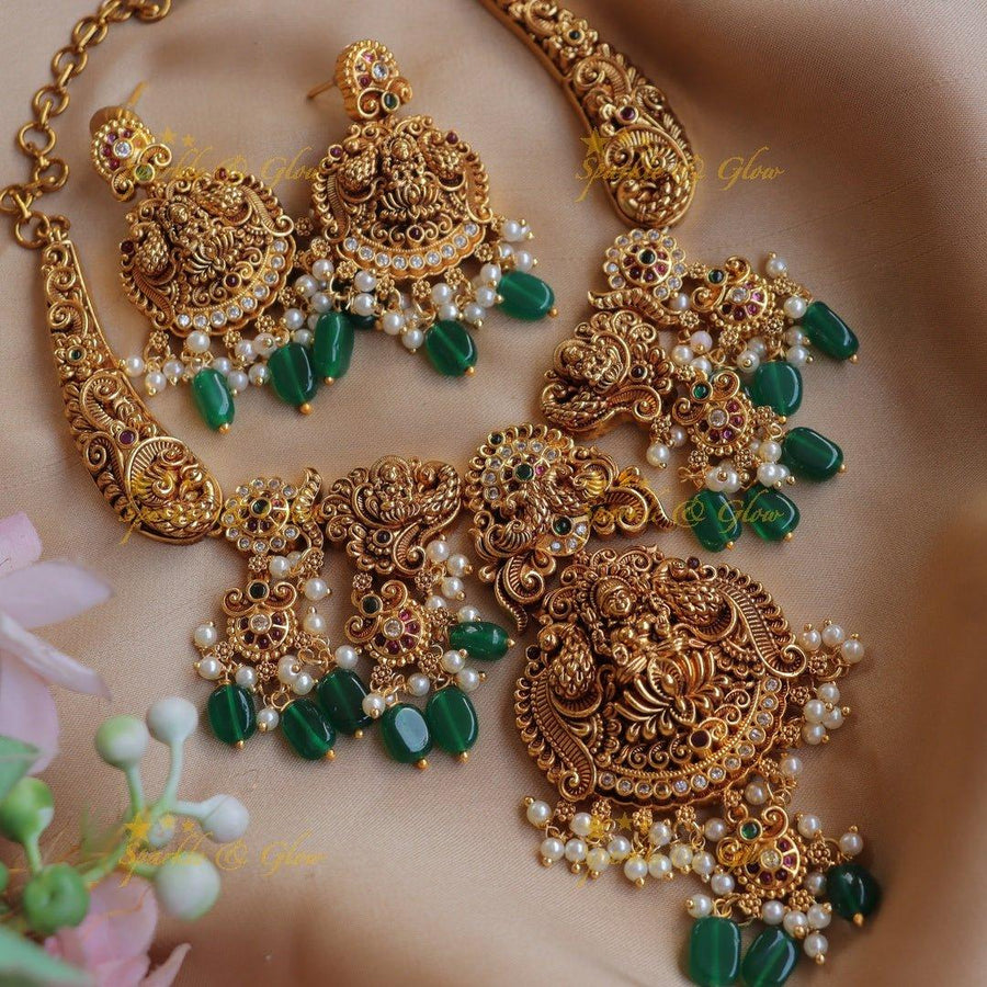 Beautiful Lakshmi design Hasli necklace with Green beads - Sparkle and Glow
