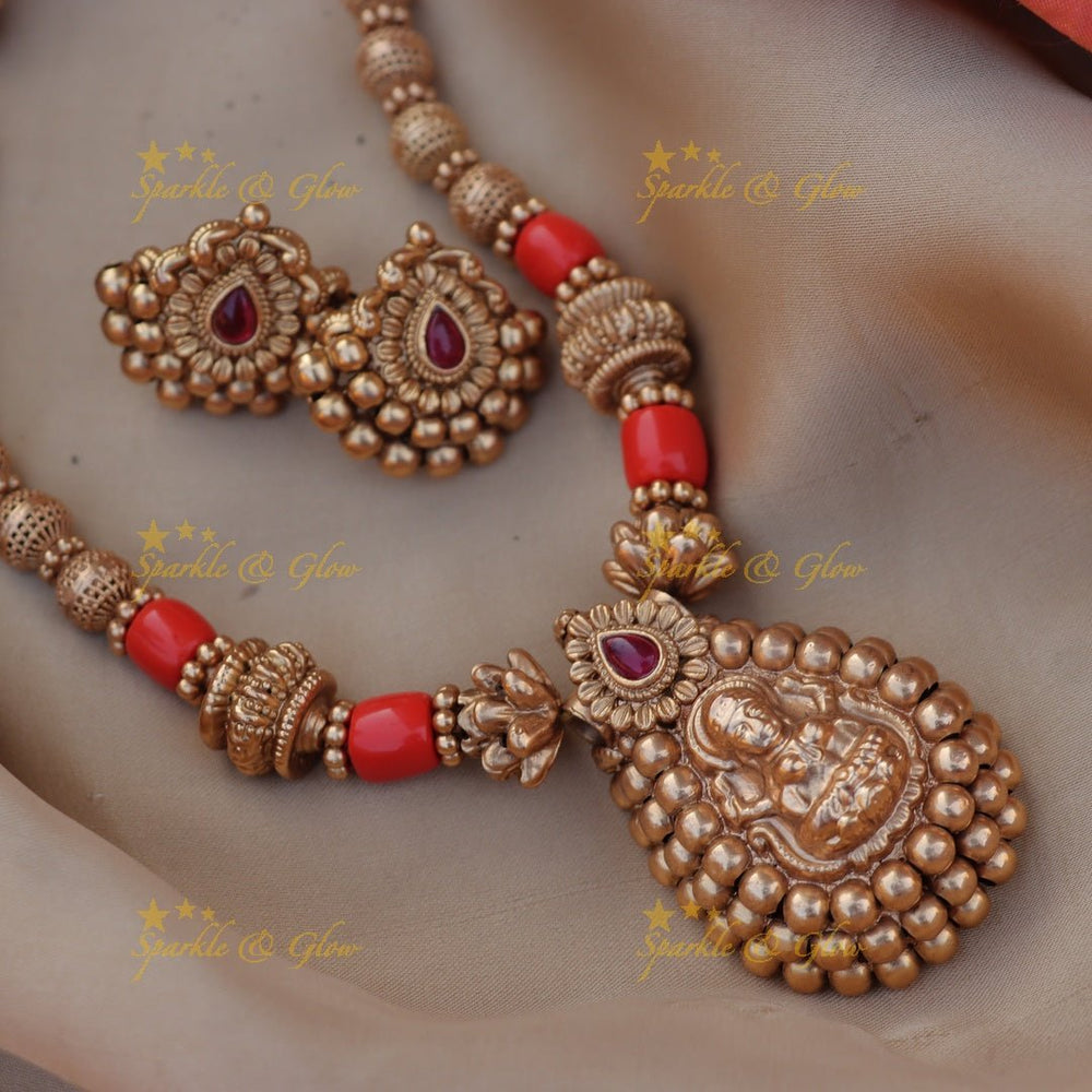 Stunning Idol Lakshmi pendant carved Coral short necklace - Sparkle and Glow - 