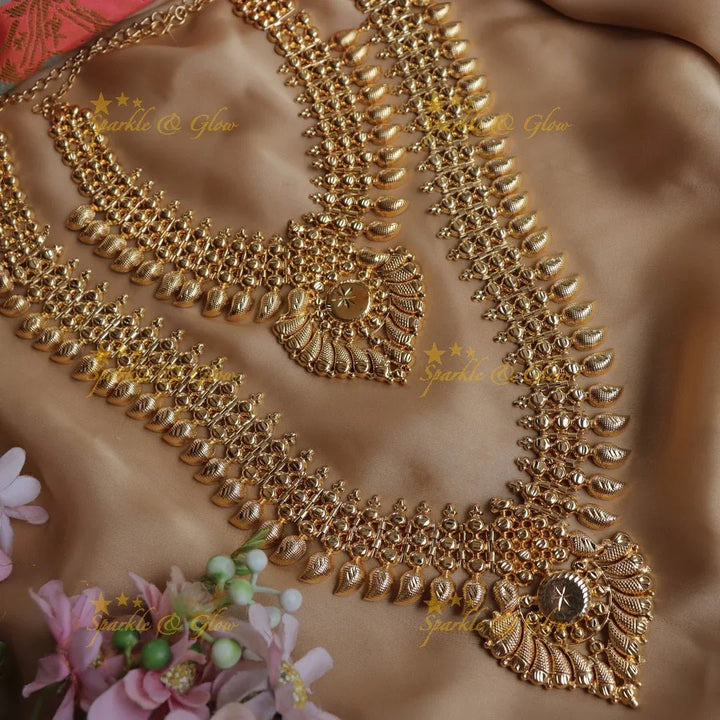 Grand mango design kerala style bridal long and short combo set - Sparkle and Glow