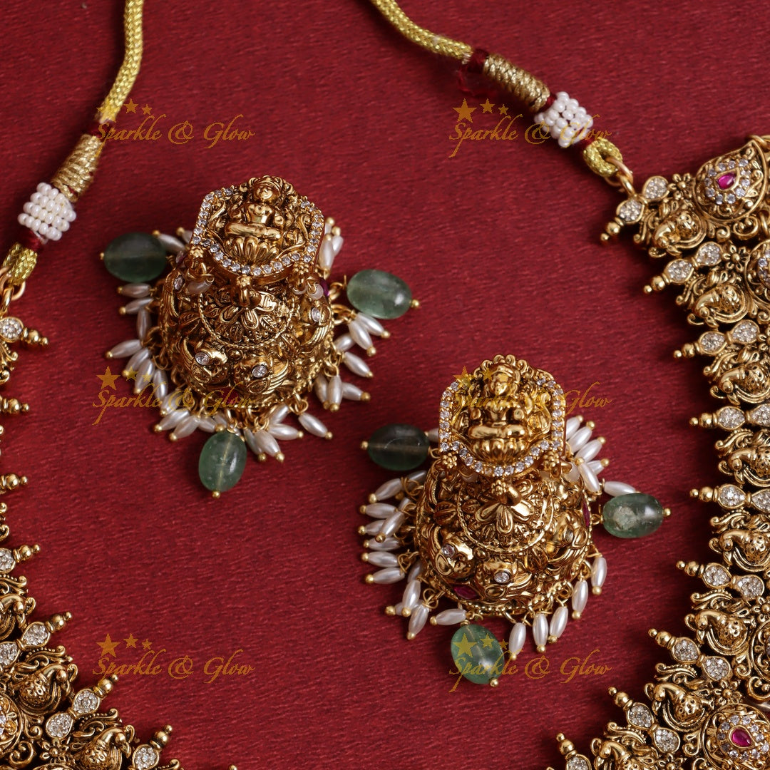 Elegant Idol Lakshmi Peacock Mango carved rice pearl guttapusalu short necklace with cz stones