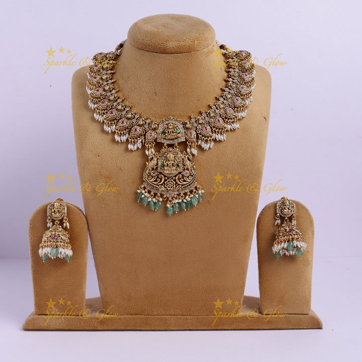 Elegant Idol Lakshmi Peacock Mango carved rice pearl guttapusalu short necklace with cz stones