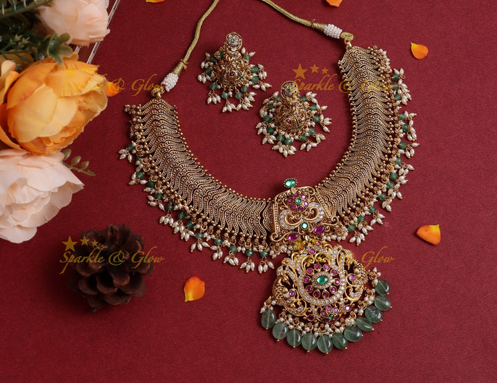 Stunning Jadau Floral pendant carved diamond design short necklace with rice pearls and Mintgreen beads
