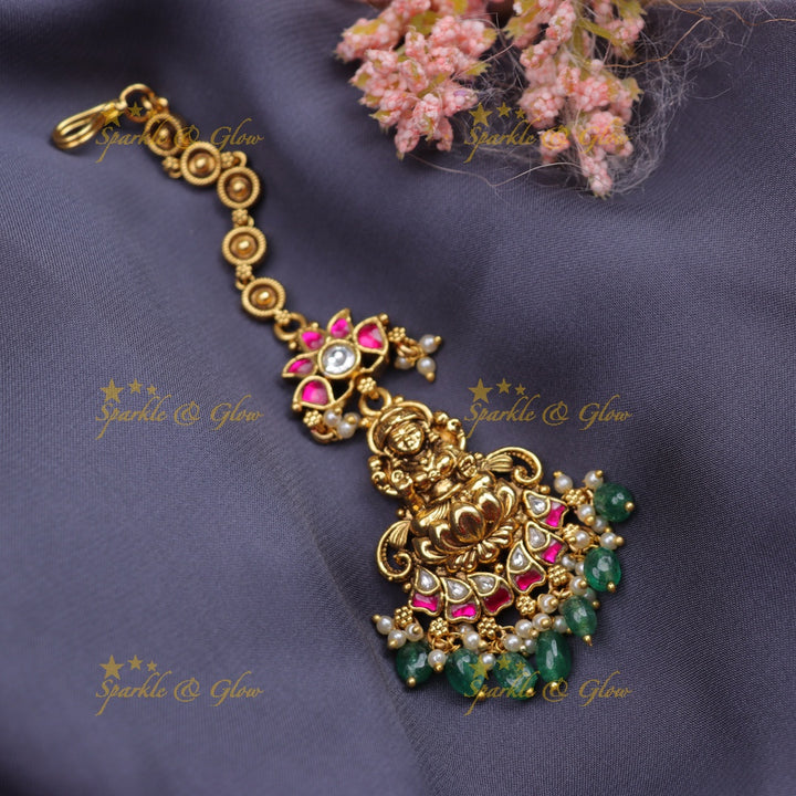 Stunning Idol Lakshmi Lotus Floral carved Jadau Kundan Maang tikka