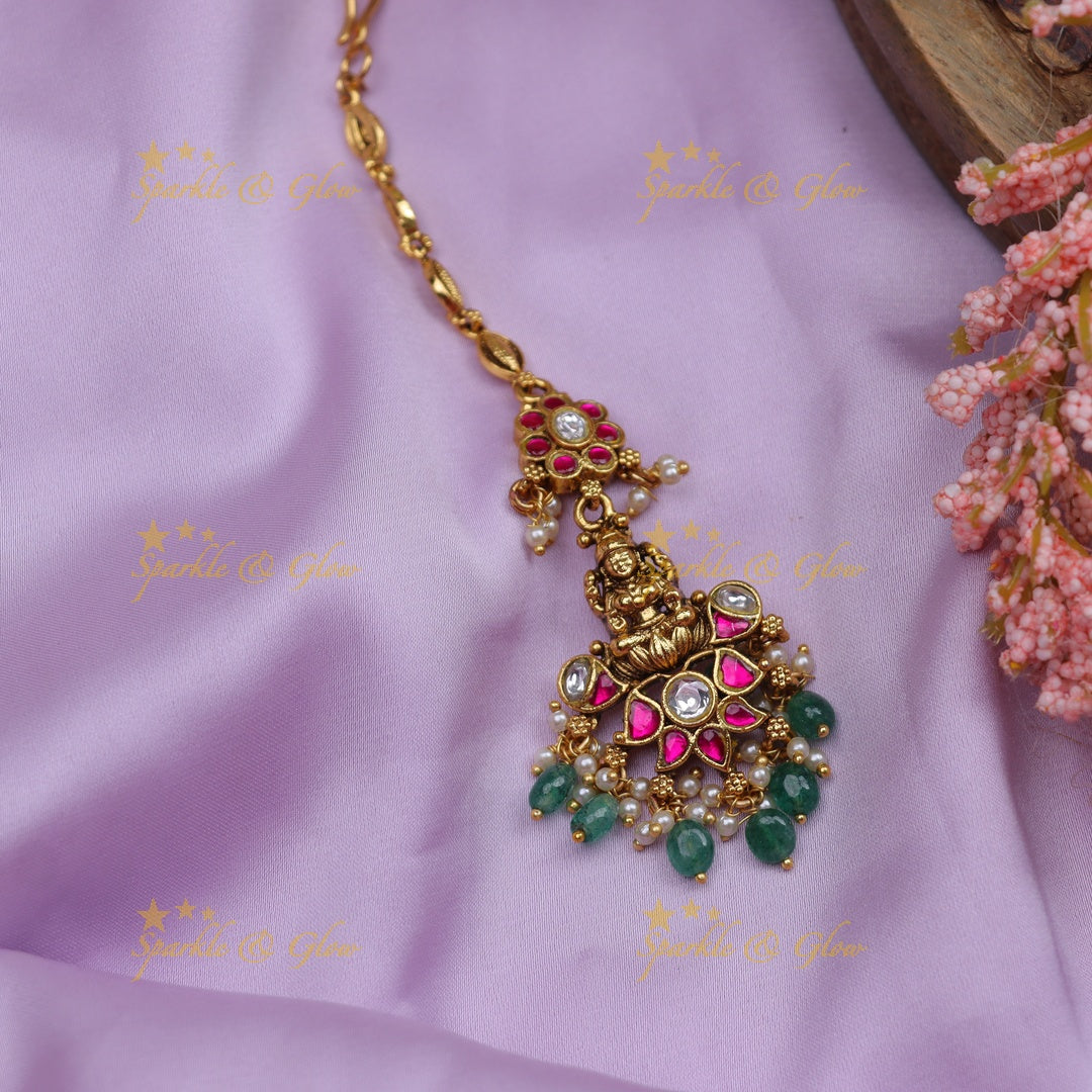 Stunning Jadau Temple Maang Tikka with Lakshmi Pendant, Kundan & Emerald Beads