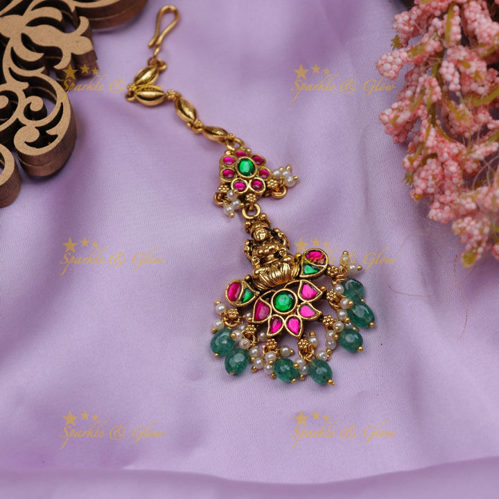 Stunning Jadau Temple Maang Tikka with Lakshmi Pendant, Kundan & Emerald Beads