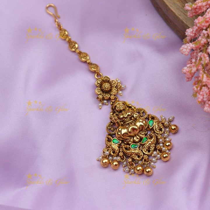 Stunning Jadau Antique Gold alike Temple Maang Tikka with Lakshmi Pendant & Pearl Drops