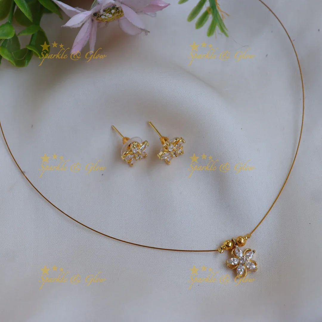 Elegant Invisible Necklace Set with Floral Pendant & Stud Earrings - Sparkle and Glow