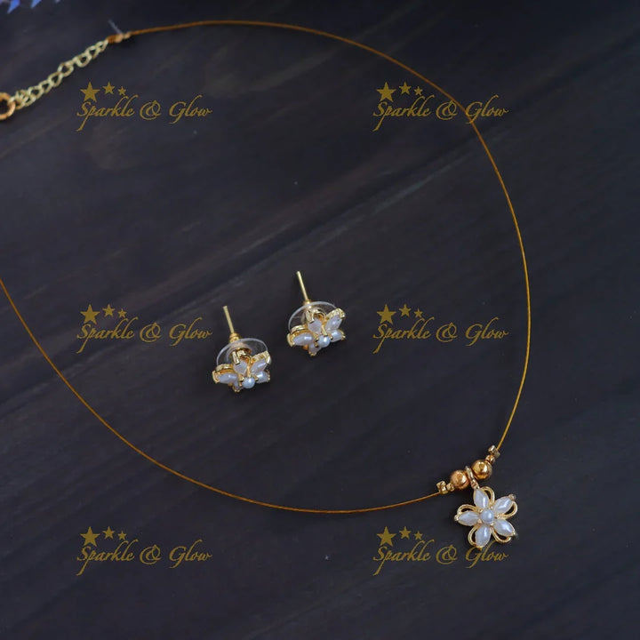 Elegant Invisible Necklace Set with Floral Pendant & Stud Earrings - Sparkle and Glow