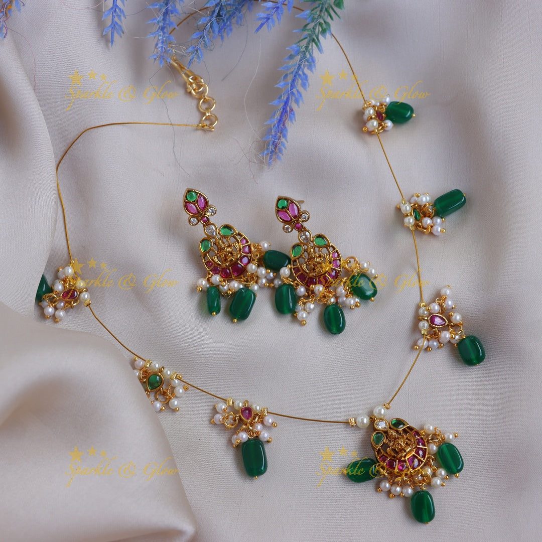 Elegant Lakshmi Floral carved Invisible Necklace set with Green Beads & Pearls