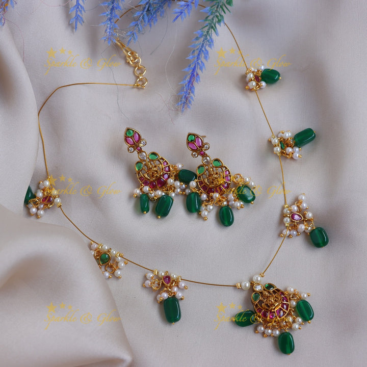 Elegant Lakshmi Floral carved Invisible Necklace set with Green Beads & Pearls