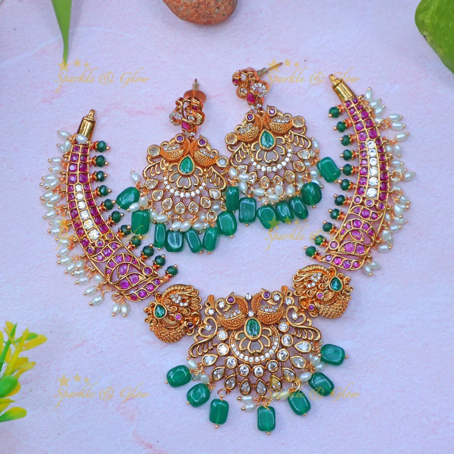 Stunning Antique Gold alike Peacock Floral Kanti Hasli Necklace Set with Green Beads - Sparkle and Glow