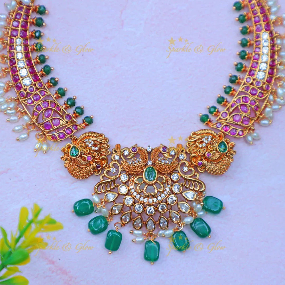 Stunning Antique Gold alike Peacock Floral Kanti Hasli Necklace Set with Green Beads - Sparkle and Glow
