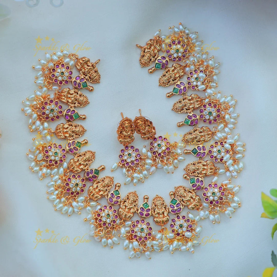 Beautiful Temple Lakshmi Necklace Set with Pearl Drops & Kundan Work - Sparkle and Glow