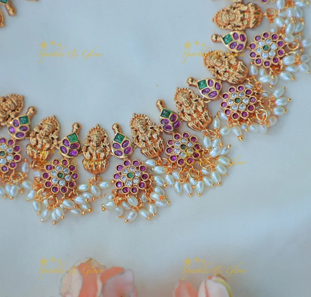 Beautiful Temple Lakshmi Necklace Set with Pearl Drops & Kundan Work - Sparkle and Glow