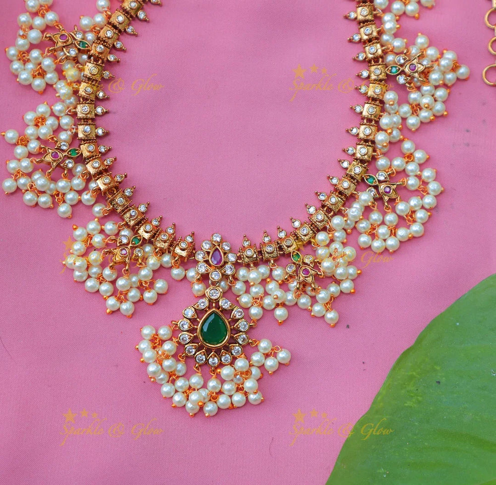 Traditional Pearl Cluster Necklace Set with Green Stone Pendant - Sparkle and Glow