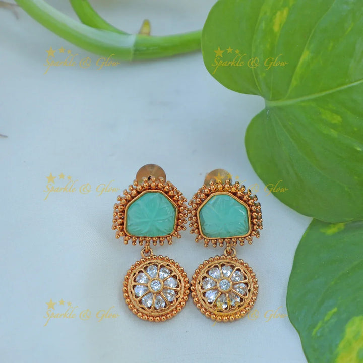 Beautiful Antique Gold alike Hasli Kanti Necklace Set with Green Stone & Floral Motif Pendants - Sparkle and Glow