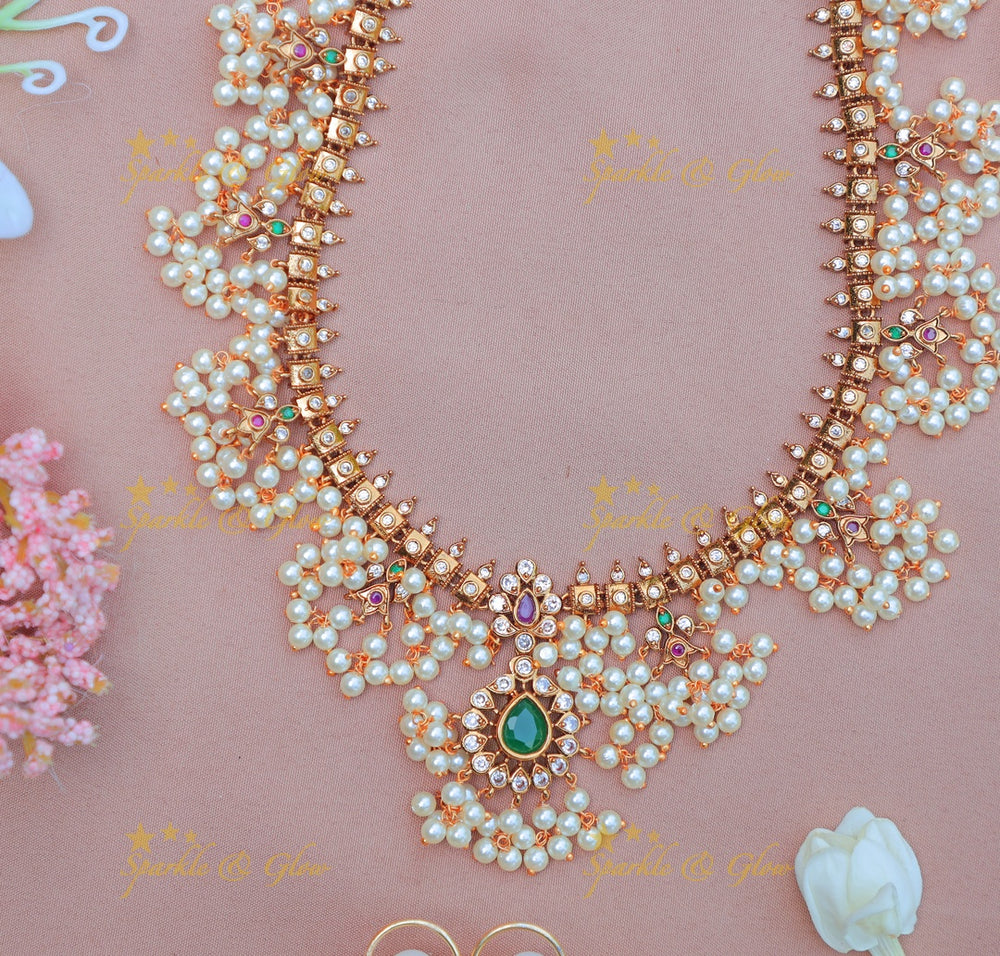 Beautiful Floral Guttapusalu Bridal Haram with Green Drop Pendant - Sparkle and Glow