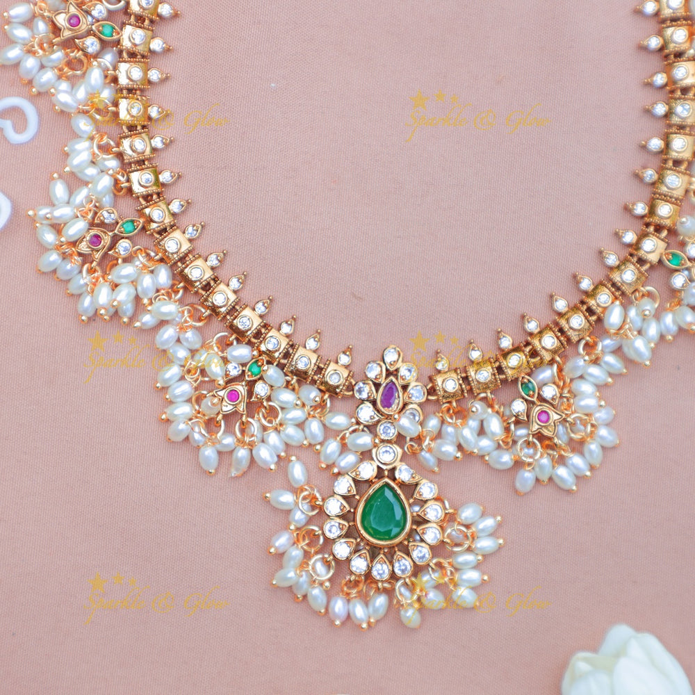Stunning Floral Guttapusalu Haram with Green Stone Pendant and Rice pearls - Sparkle and Glow