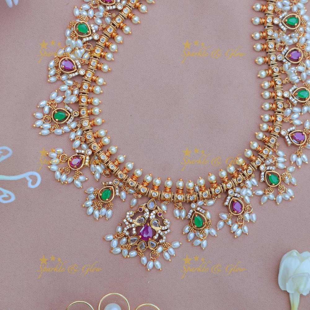 Beautiful gold alike Floral rice pearl Guttapusalu Haram with Green & Pink Stones - Sparkle and Glow