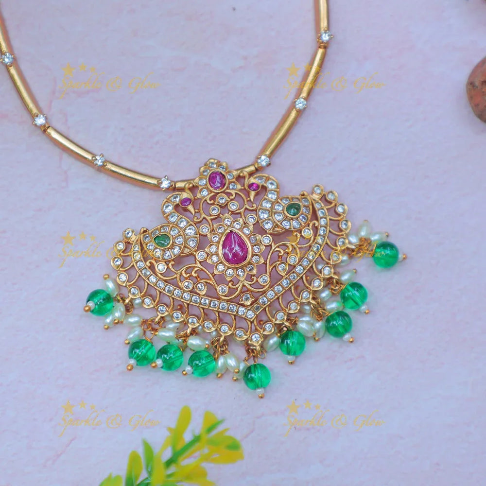 Stunning Gold alike Hasli Kanti Necklace Set with Green Beads & Stone Studded Pendant - Sparkle and Glow