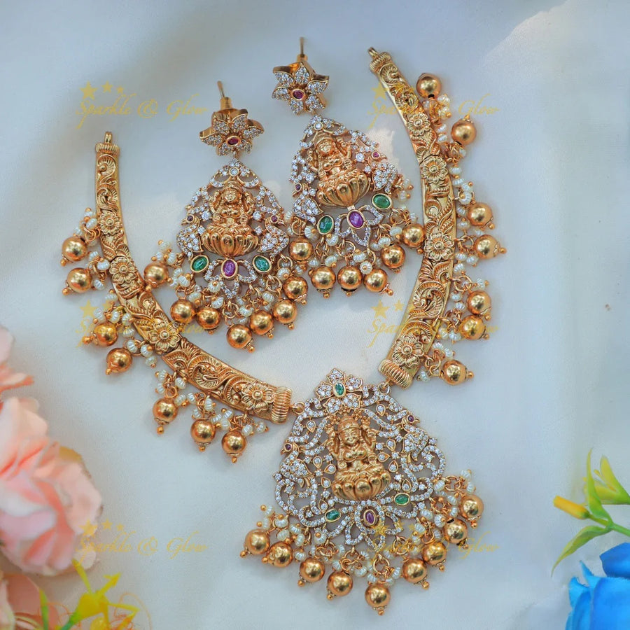 Elegant Antique Gold alike Temple Hasli Kanti Necklace Set with Lakshmi Motif - Sparkle and Glow