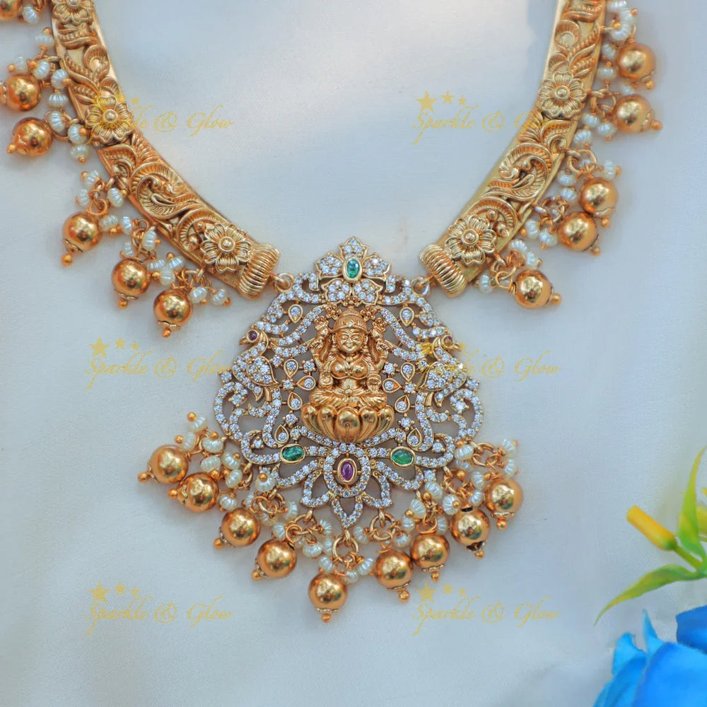 Elegant Antique Gold alike Temple Hasli Kanti Necklace Set with Lakshmi Motif - Sparkle and Glow