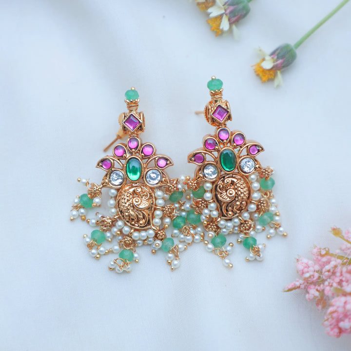 Stunning Jadau Kundan Antique Peacock Motif Necklace Set with Green Beads - Sparkle and Glow