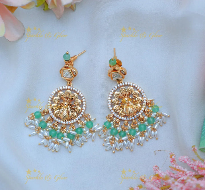 Stunning Jadau Kundan Idol Lakshmi Peacock carved short necklace with Emerald stones and rice pearls - Sparkle and Glow