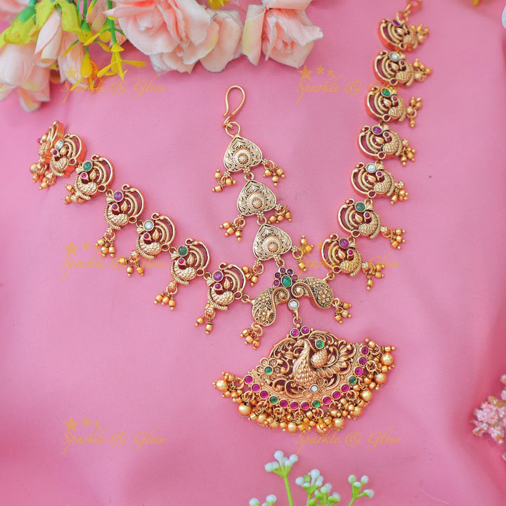Elegant Antique Peacock Maang Tikka with Green Beads and Temple Design