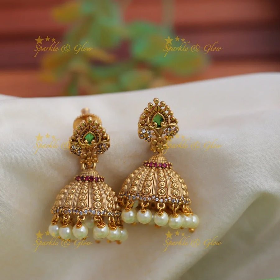 Beautiful Antique Gold alike Jhumka Earrings with Pearl Drops - Sparkle and Glow