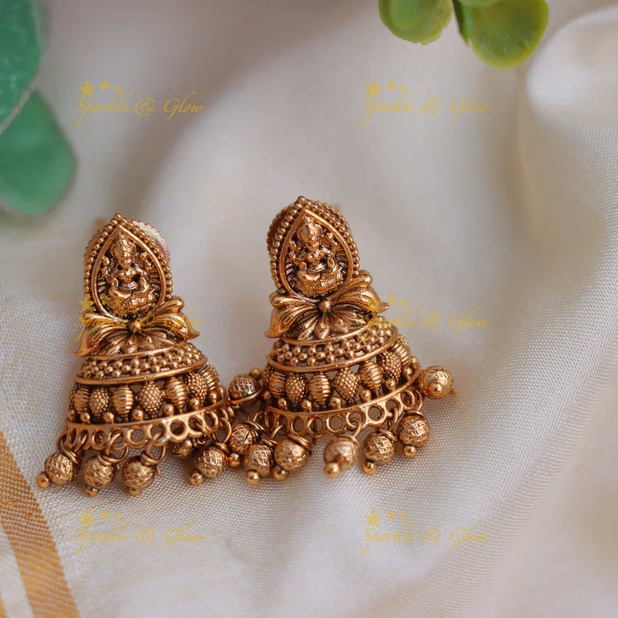 Premium Matte gold alike Lakshmi Floral Jhumka with gold beads drop - Sparkle and Glow