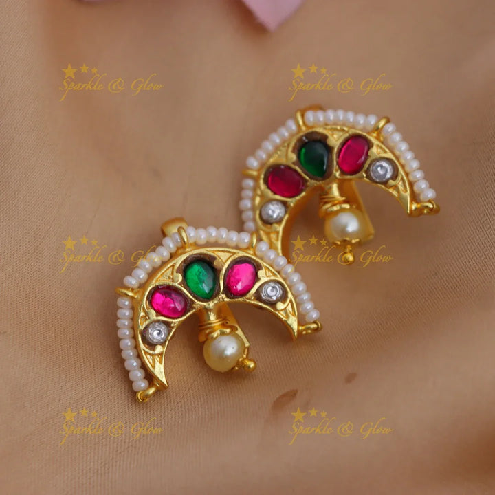 Elegant Jadau Kundan Crescent-Shaped Bugadi Earrings with Green-Pink Stones & Pearl Lining - Sparkle and Glow
