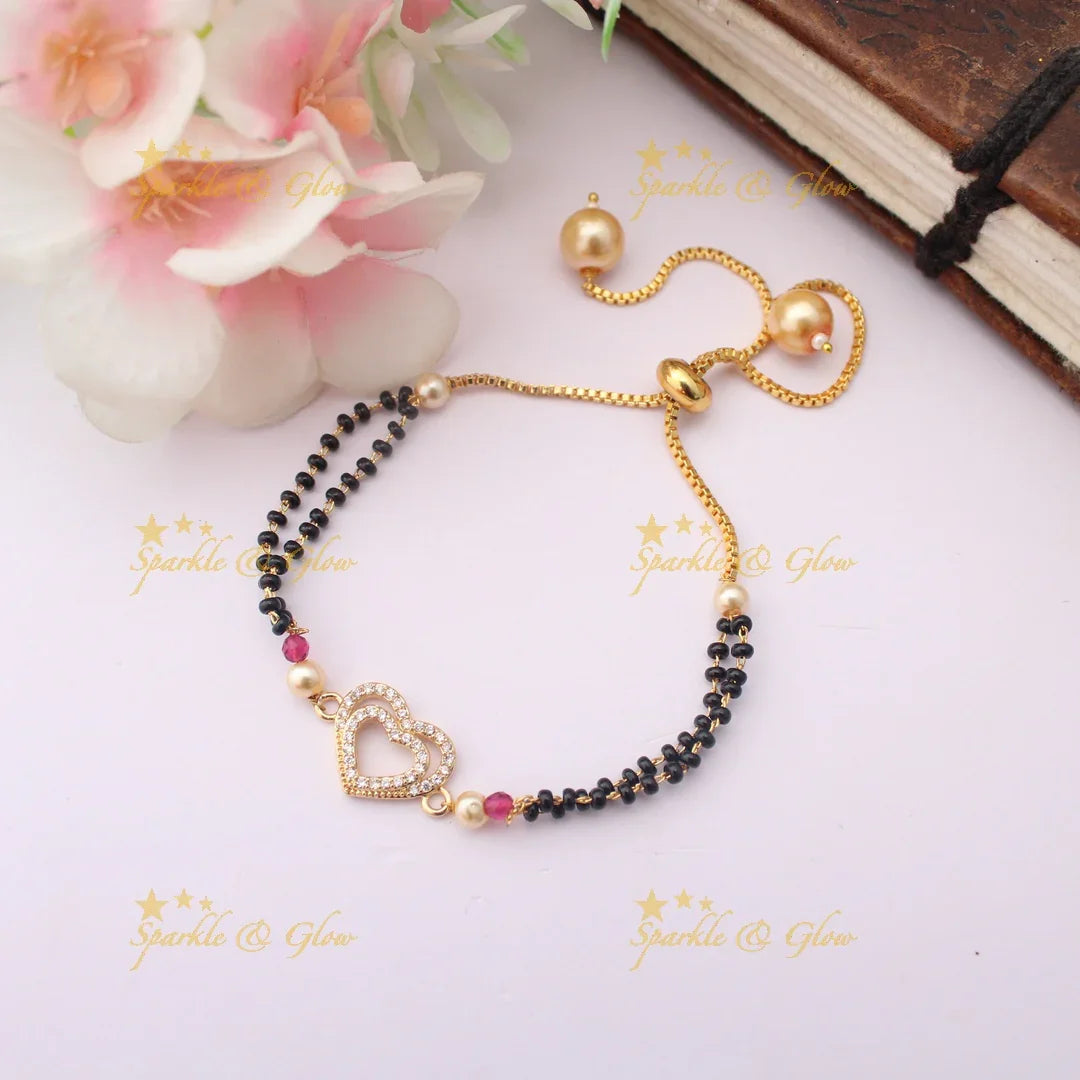 Stunning Adjustable Mangalsutra inspired Bracelet with Double Heart Charm