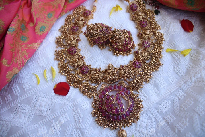 Gold alike polished kemp stones peacock and lakshmi carved gutta pusalu - Sparkle and Glow - Gold - Back Thread