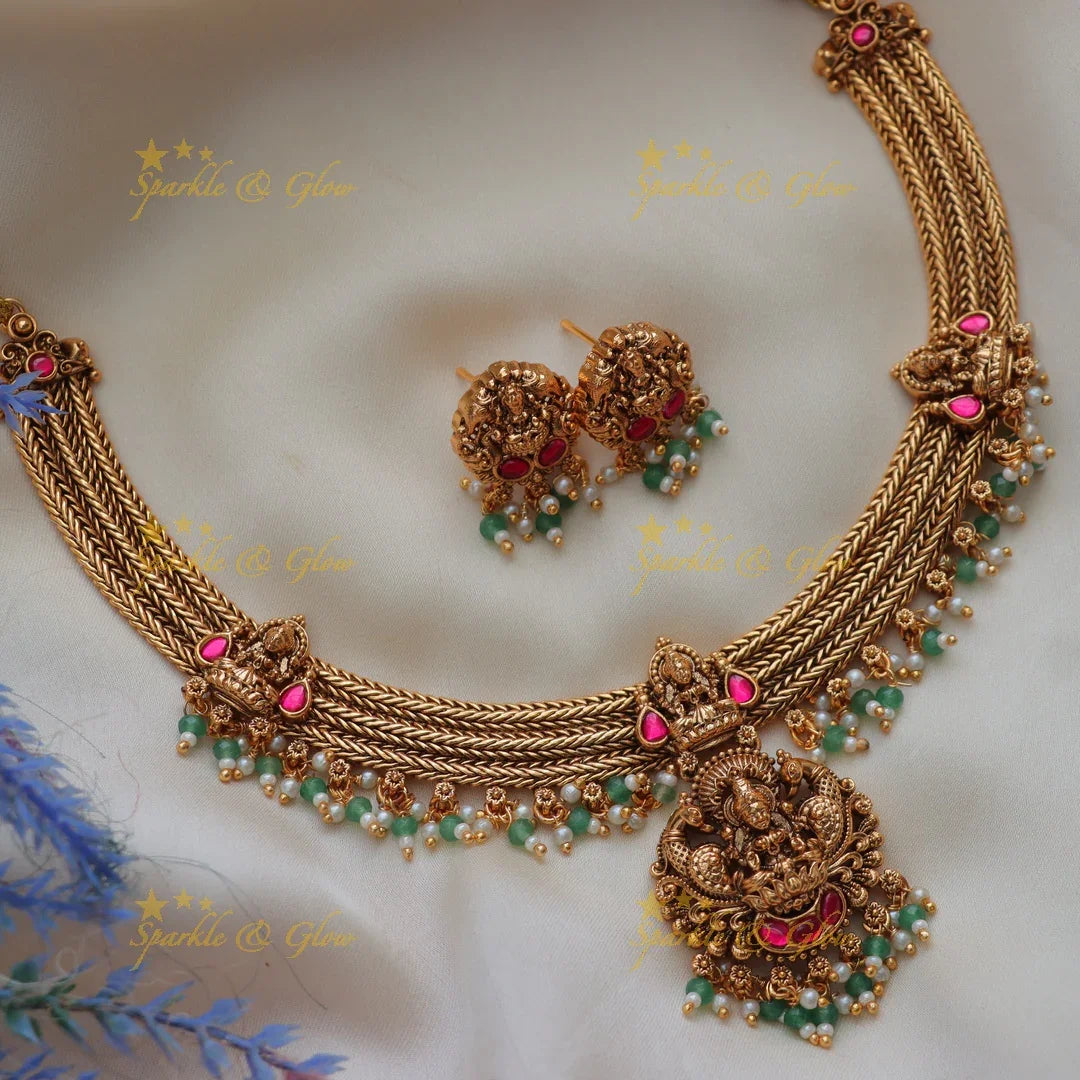 Regal Jadau Lakshmi Temple Necklace Set with Green Beads