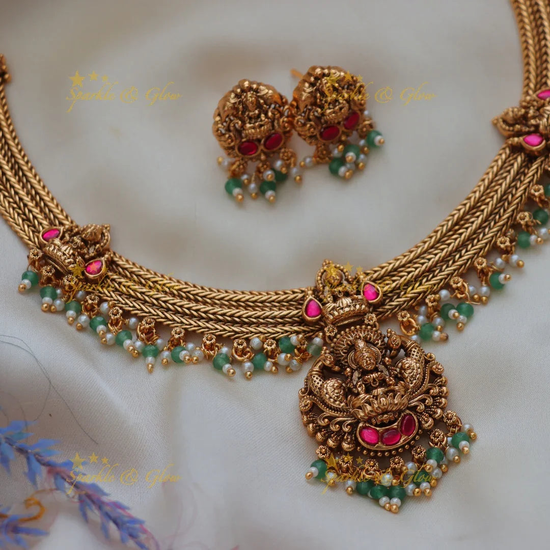 Regal Jadau Lakshmi Temple Necklace Set with Green Beads