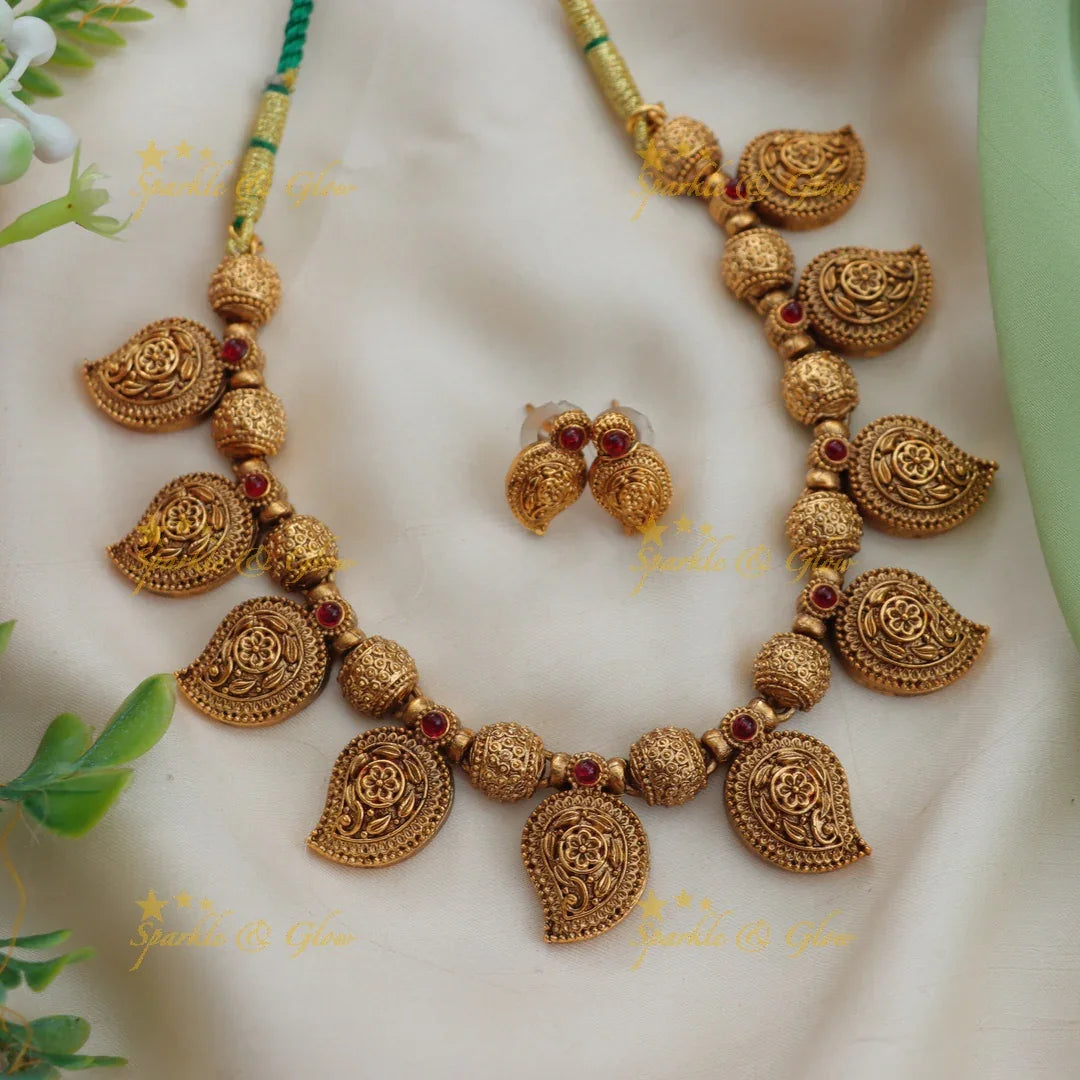 Budgeted Mango Floral Carved Gold Finish Short Necklace