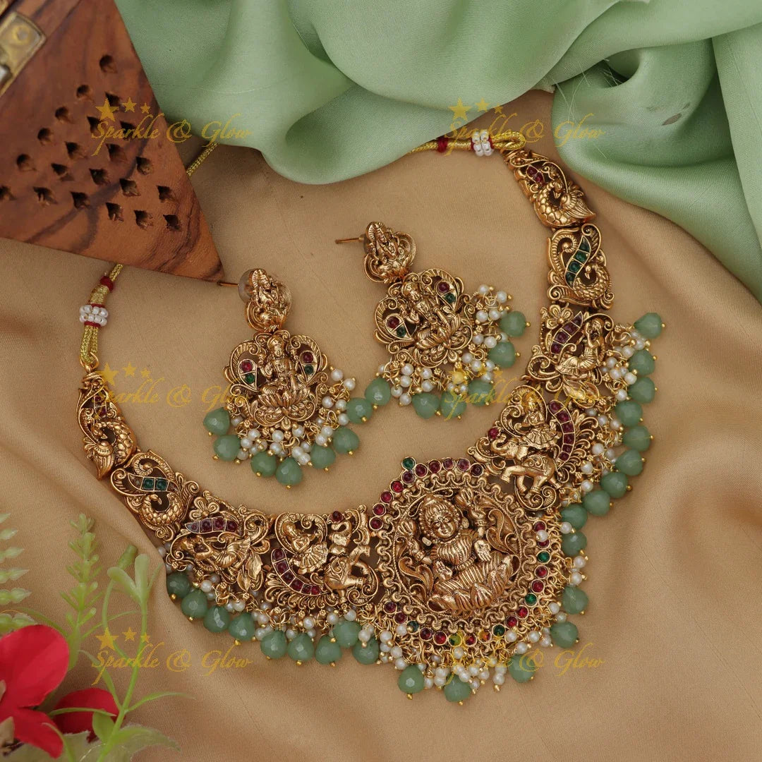 Elegant Lakshmi Elephant carved short necklace with Mintgreen beads