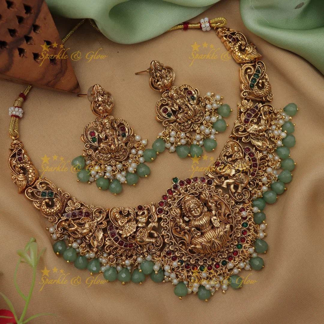 Elegant Lakshmi Elephant carved short necklace with Mintgreen beads