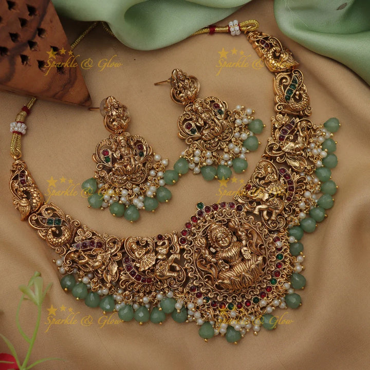 Elegant Lakshmi Elephant carved short necklace with Mintgreen beads