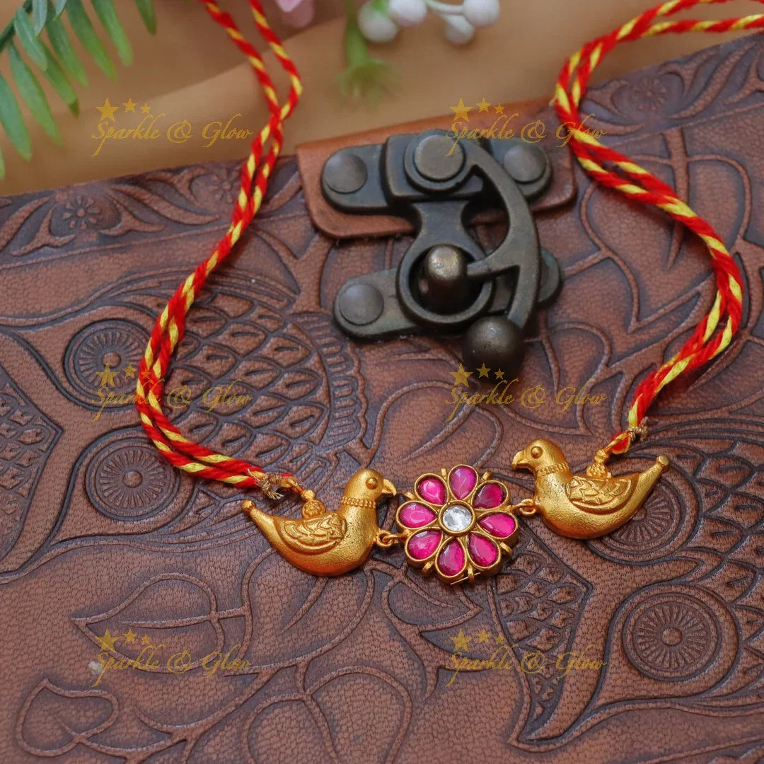 Exquisite Dual Tone Jadau Kundan Rakhi for Festive Elegance