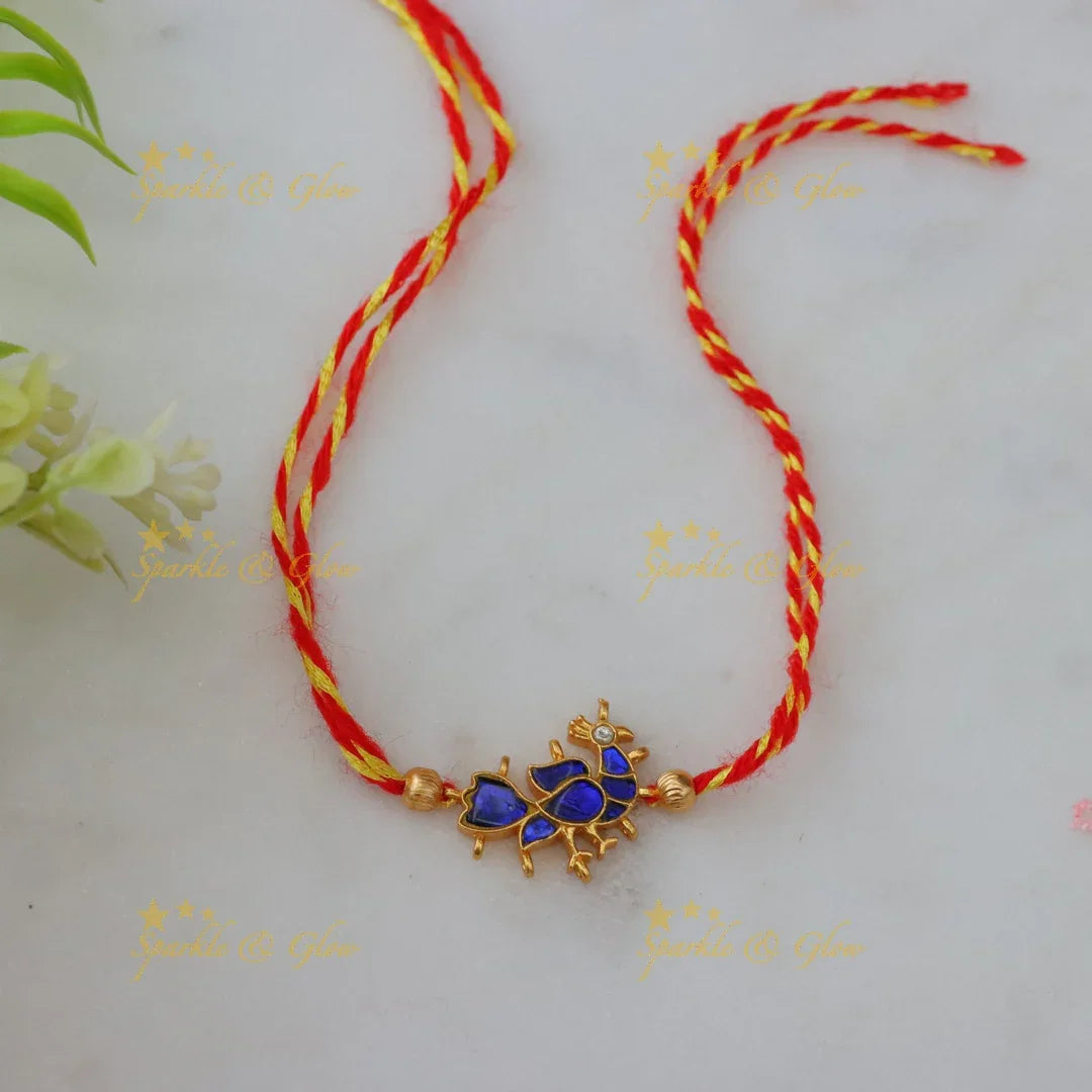 Elegant Peacock Kundan Rakhi – Festive Grace Unveiled