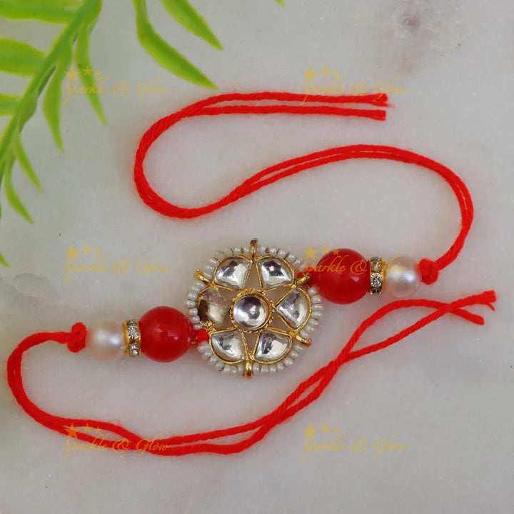 Exquisite Kundan Rakhi with Floral Design & Red Thread