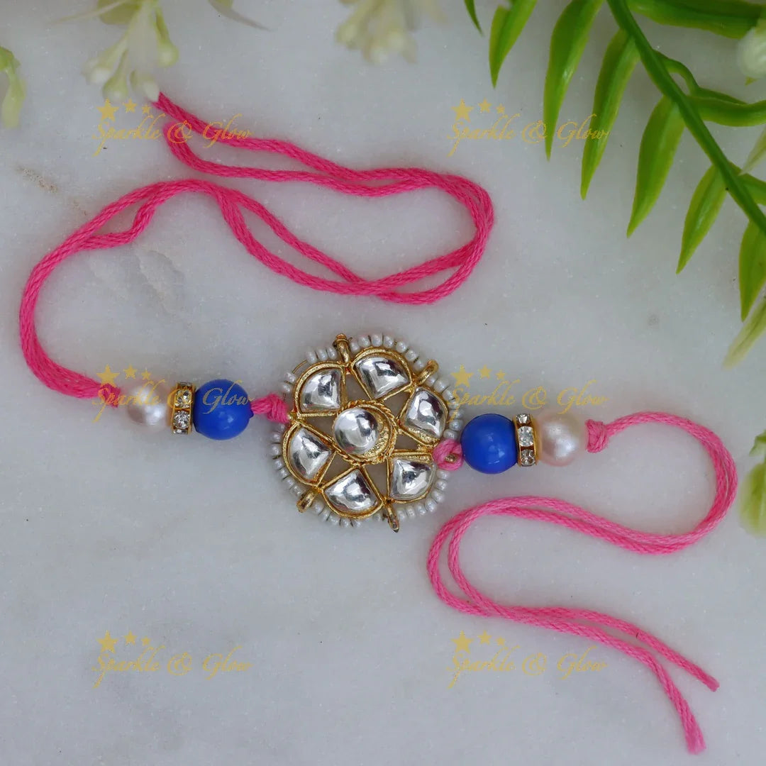 Exquisite Kundan Rakhi with Floral Design & Red Thread
