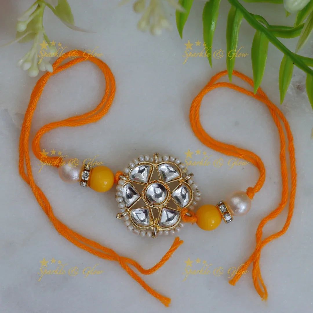 Exquisite Kundan Rakhi with Floral Design & Red Thread