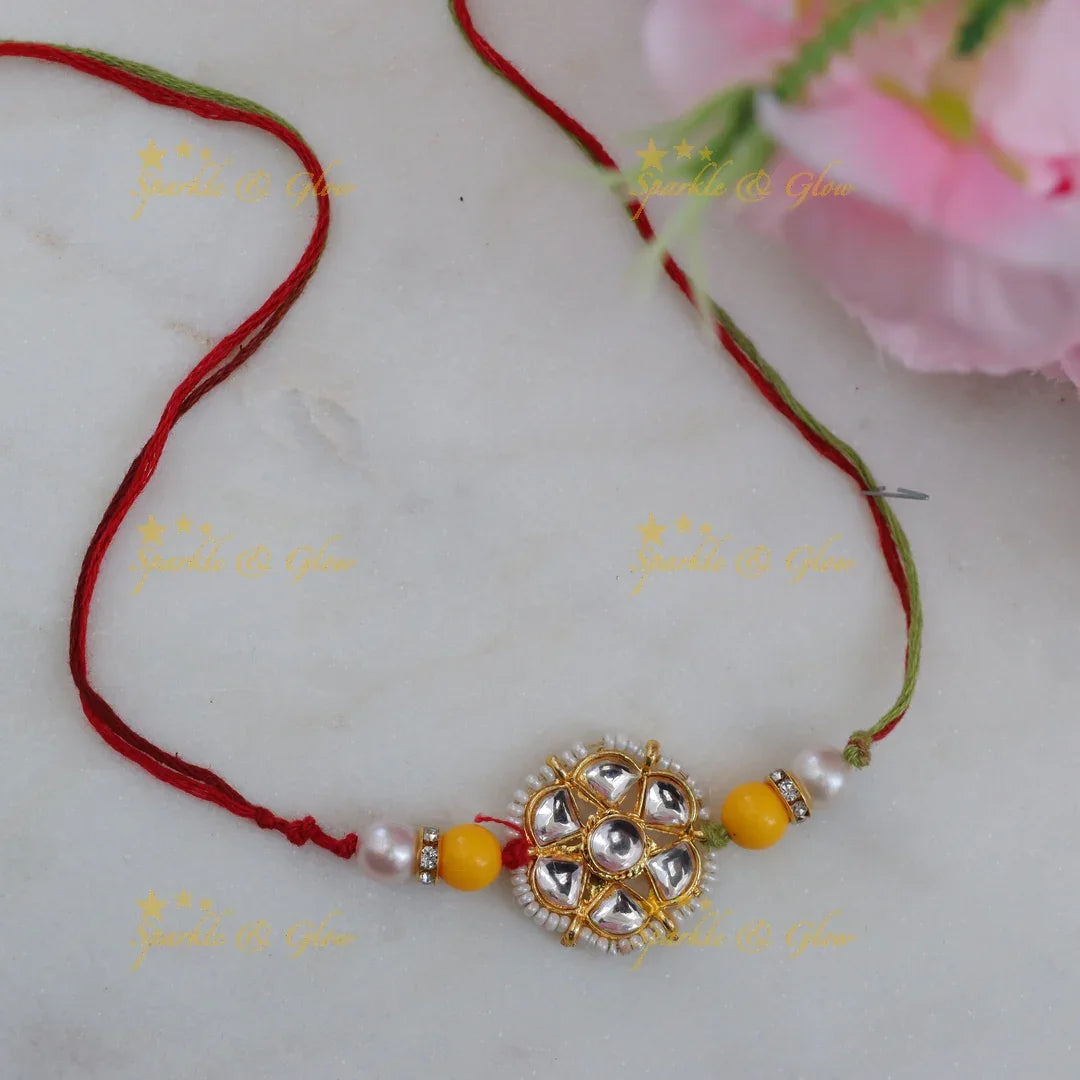 Exquisite Kundan Rakhi with Floral Design & Red Thread