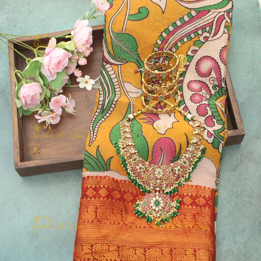 Exquisite Peacock Kalamkari Saree - Designer Elegance